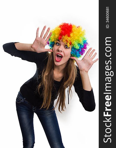 Cheerful girl and multi-colored wig