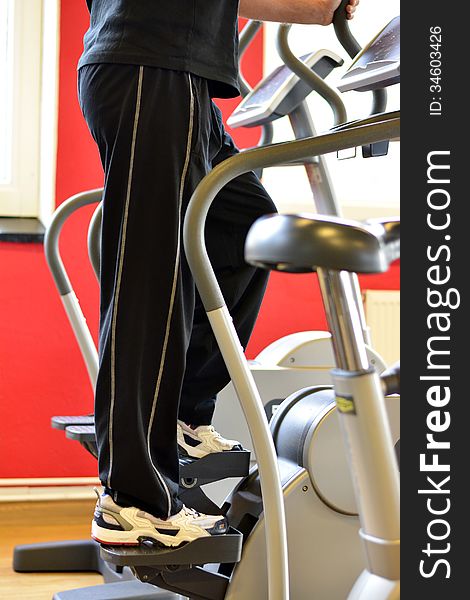 Man working out on a stair machine