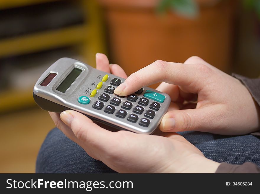 Woman S Hands With A Calculator