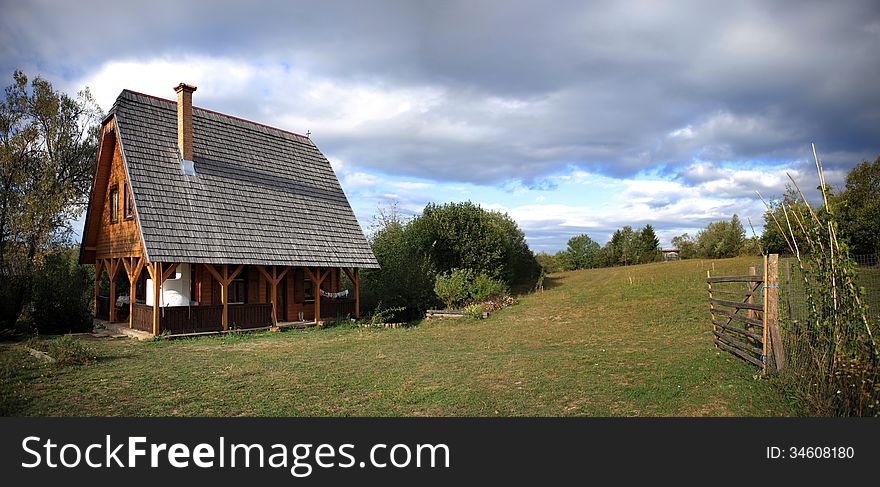 Panoramic view about a traditional transylvanian wood house. Panoramic view about a traditional transylvanian wood house.