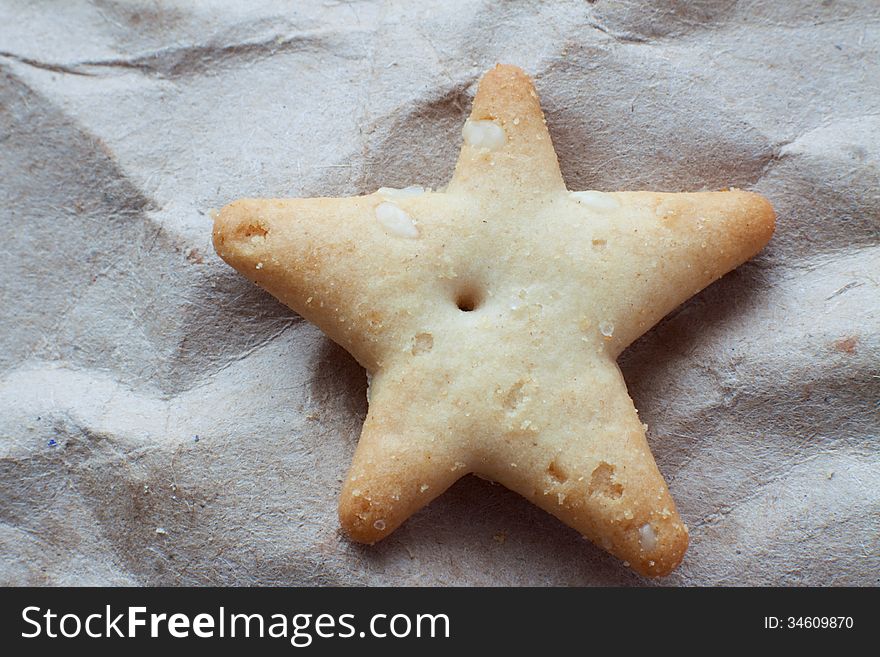 Biscuits in the shape of a star the background paper closeup