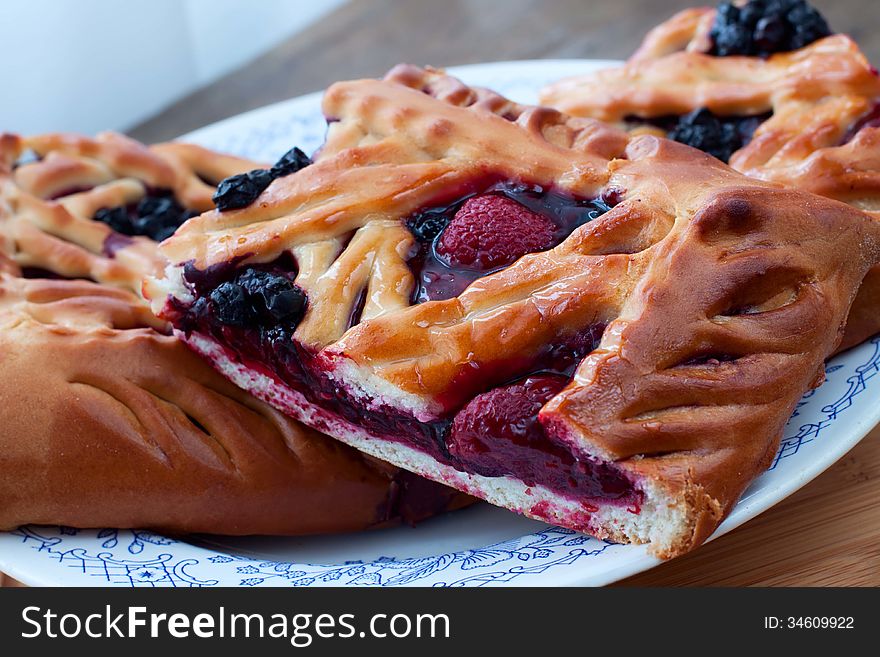 Berry pie on a plate closeup