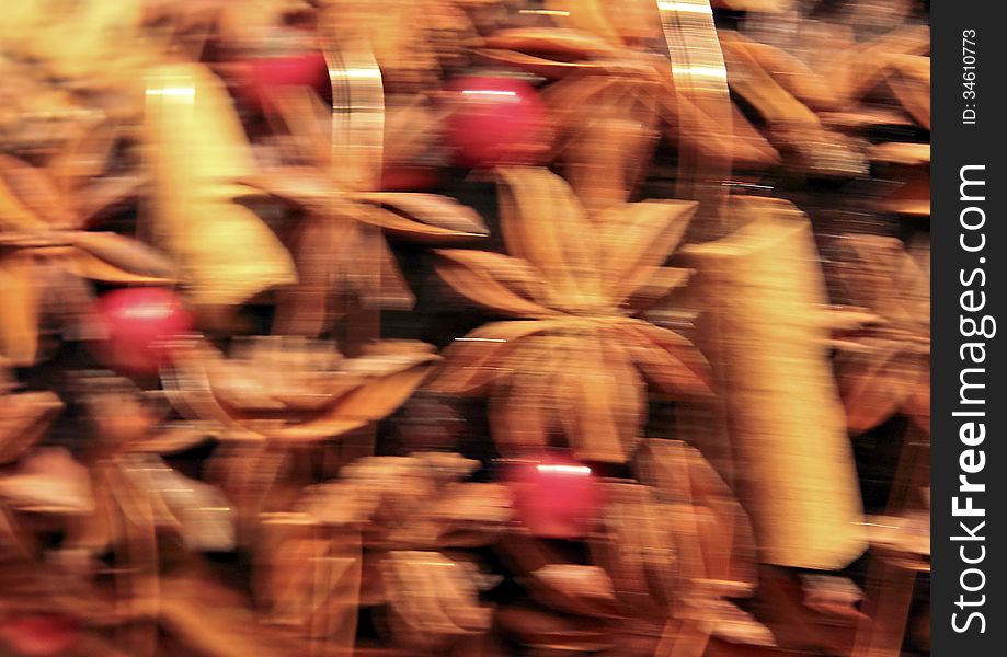 Soft focus blur abstract image of cinnamon sticks star anise and holly berrys. Soft focus blur abstract image of cinnamon sticks star anise and holly berrys