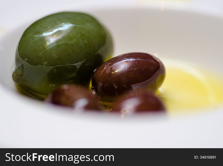 Kalamata and large green olives snack. Kalamata and large green olives snack