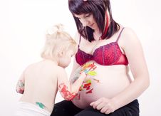 Child Painting Moms Belly Royalty Free Stock Image