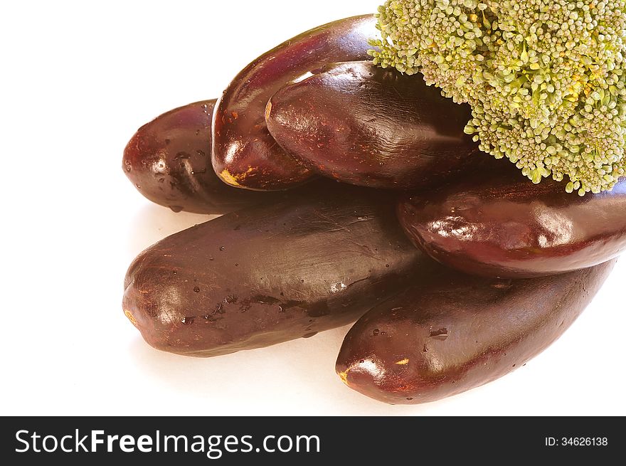 Group eggplant on a white background in the corner of the image. Group eggplant on a white background in the corner of the image