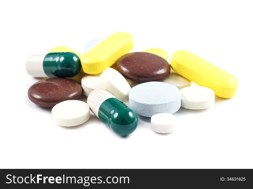 A bunch of medicine pills isolated on white background