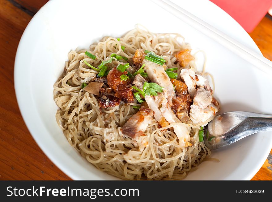 Bowl of traditional Chinese red pork noodles no soup