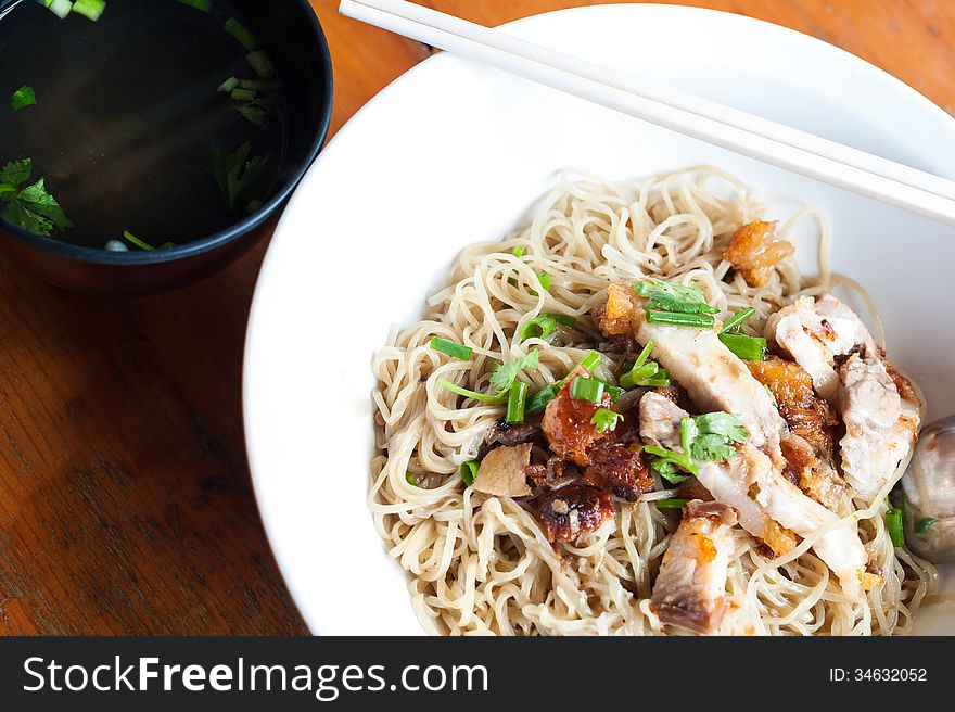 Bowl of traditional Chinese red pork noodles no soup