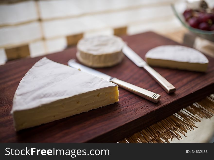 Cheese On Wooden Board