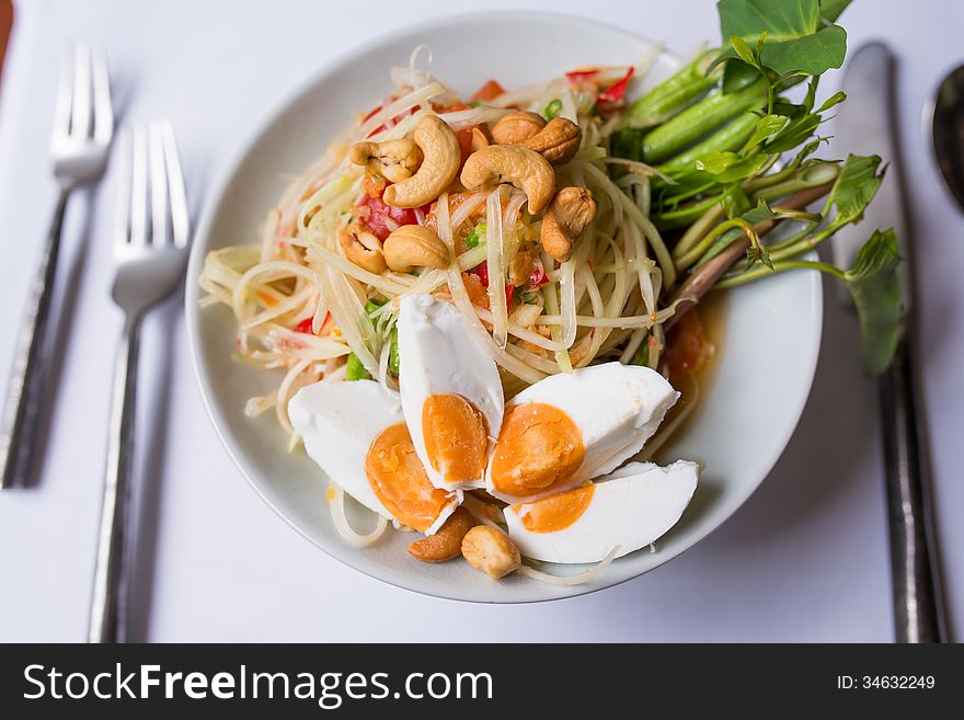 Papaya salad spicy with salted eggs