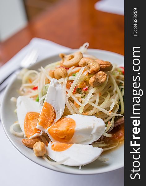 Papaya salad spicy with salted eggs