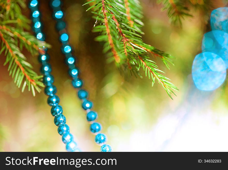 Bright christmas decoration bead on the fir branch. Bright christmas decoration bead on the fir branch