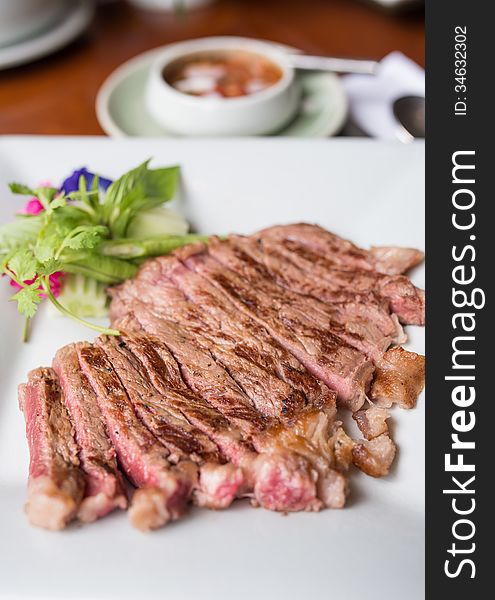 Beef sliced steak grilled with spicy sauce