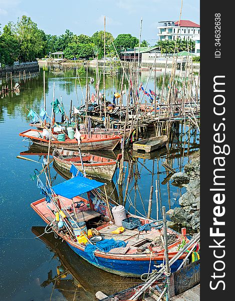 Fishing village asian style in blue sky .