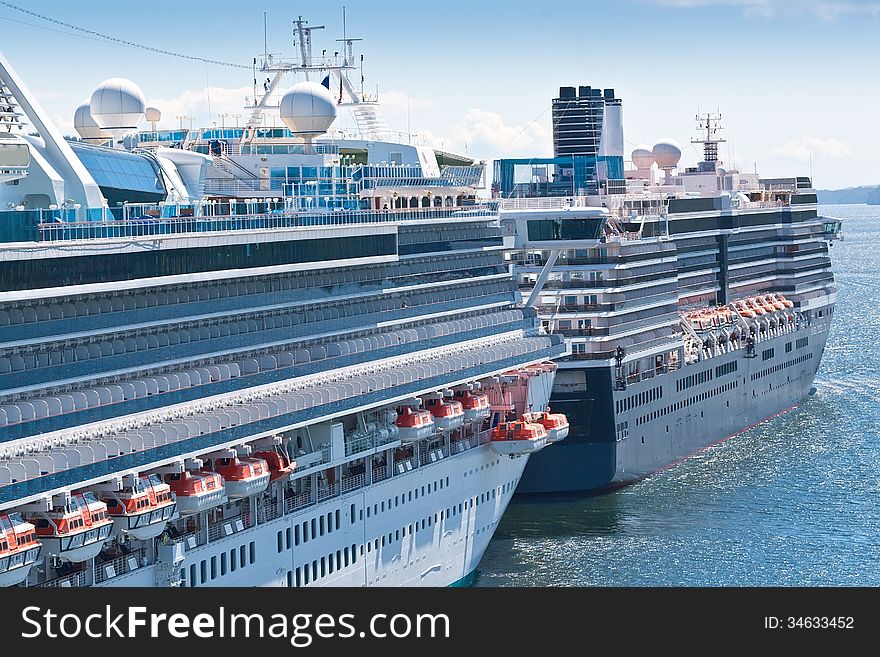 Two cruise ships anchored in the port of Ketchikan, Alaska. Two cruise ships anchored in the port of Ketchikan, Alaska