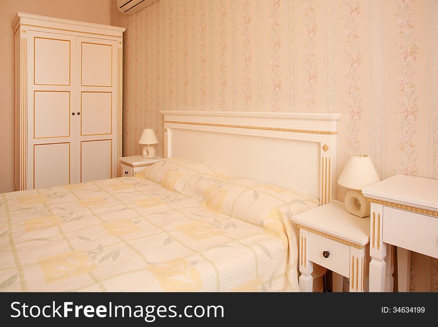 Antique style decorated bedroom interior