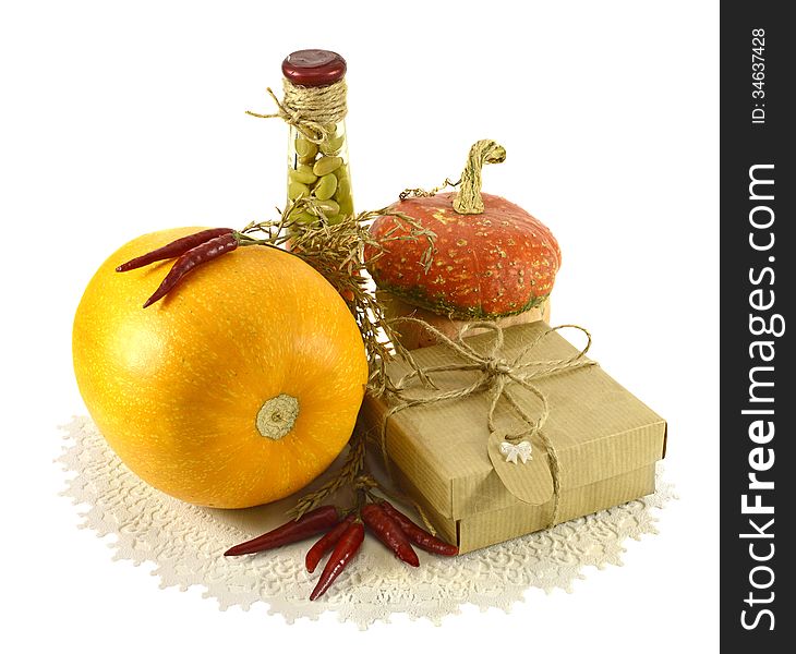 Thanksgiving still life with gift and pumpkins isolated