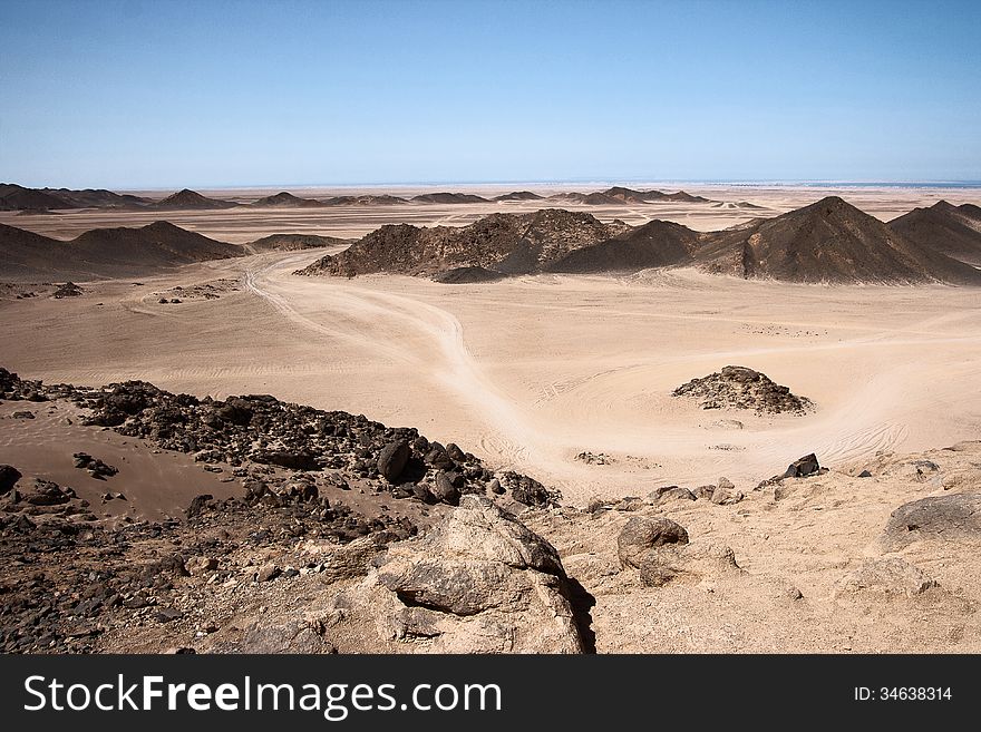 A dirt road in the African desert. A dirt road in the African desert