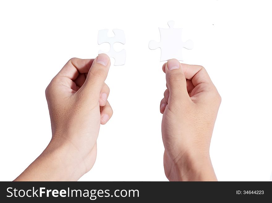 Hands And Puzzle