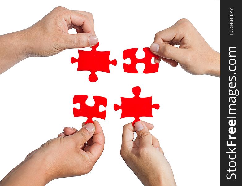 Hands and puzzle isolated on white background