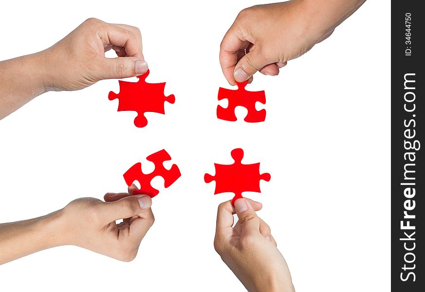 Hands and puzzle isolated on white background