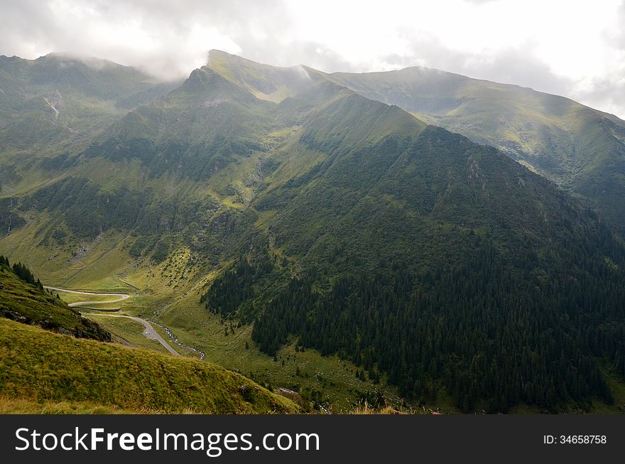 One of the steep mountains that form the southern wall of the Transfagarasan pass, located in the Fagaras mountain range, Romania. One of the steep mountains that form the southern wall of the Transfagarasan pass, located in the Fagaras mountain range, Romania.