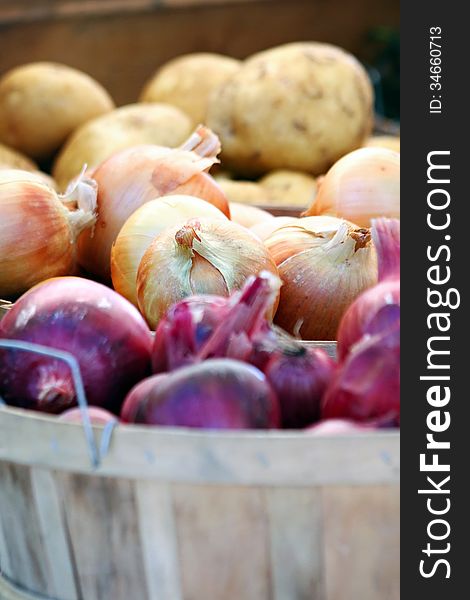 Variety of onions in baskets. Variety of onions in baskets.