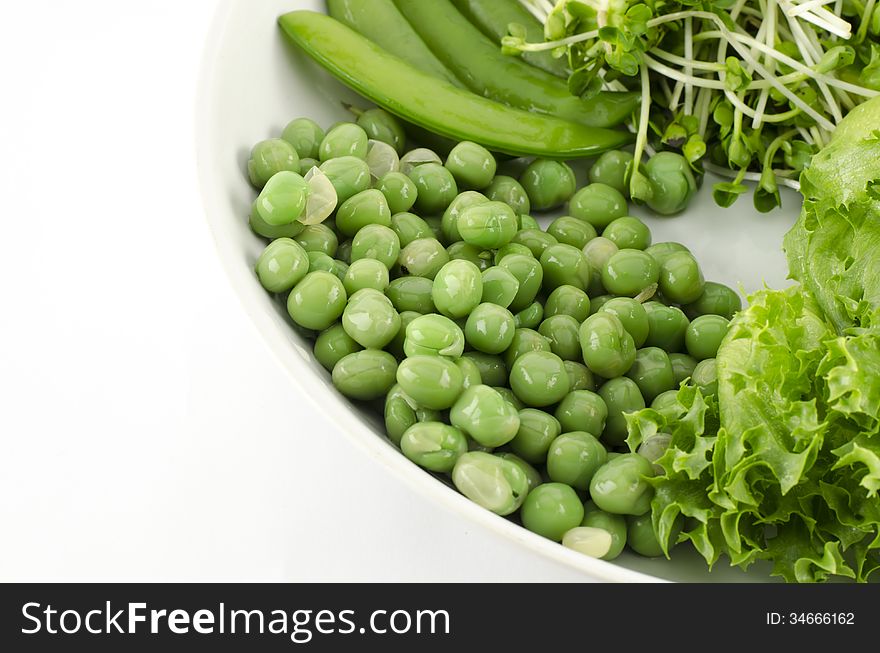 Green Vegetable On White Dish Isolated On White Background