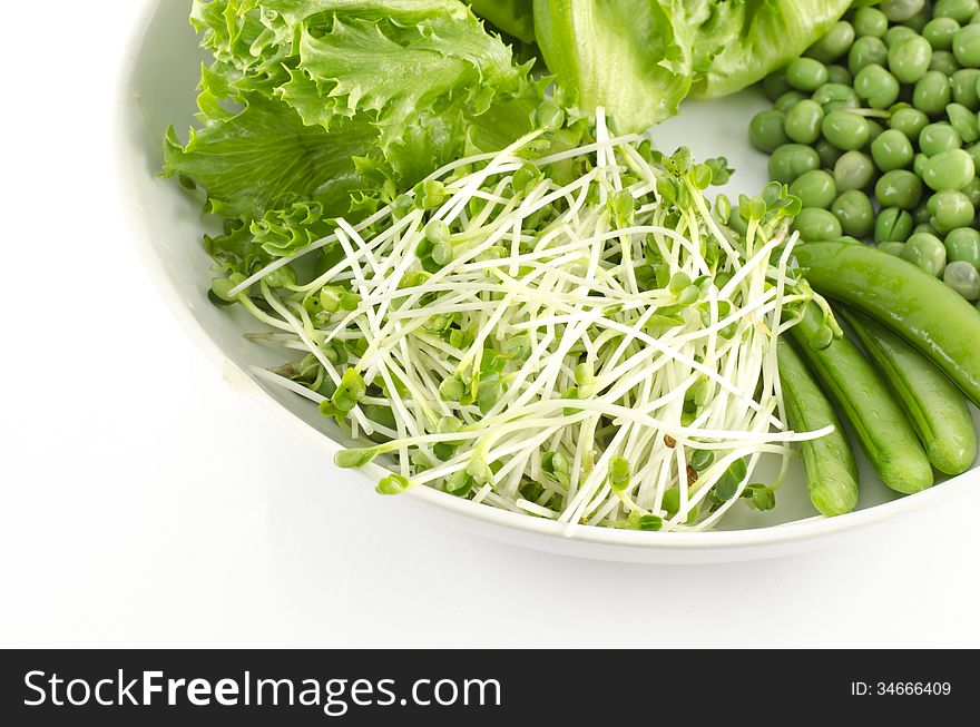 Green Vegetable On White Dish Isolated On White Background