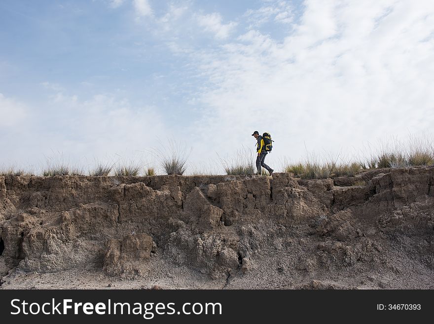 Hikers walking in autumn steep hill. Asian Youth. Hikers walking in autumn steep hill. Asian Youth