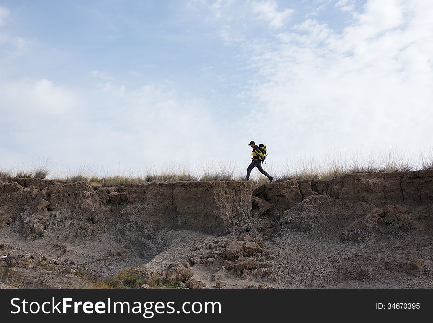 Hikers walking in autumn steep hill. Asian Youth. Hikers walking in autumn steep hill. Asian Youth