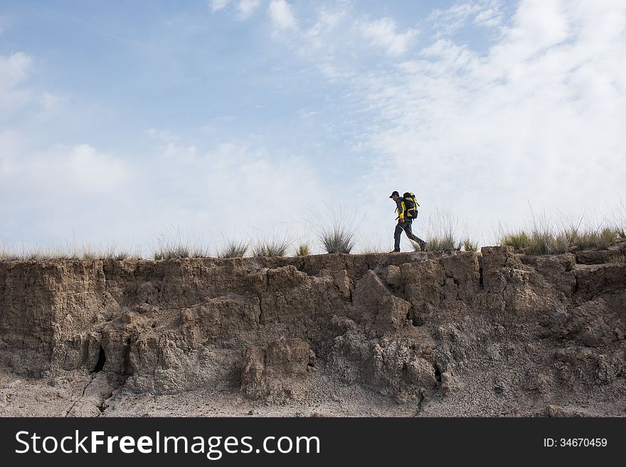 Hikers walking in autumn steep hill. Asian Youth. Hikers walking in autumn steep hill. Asian Youth