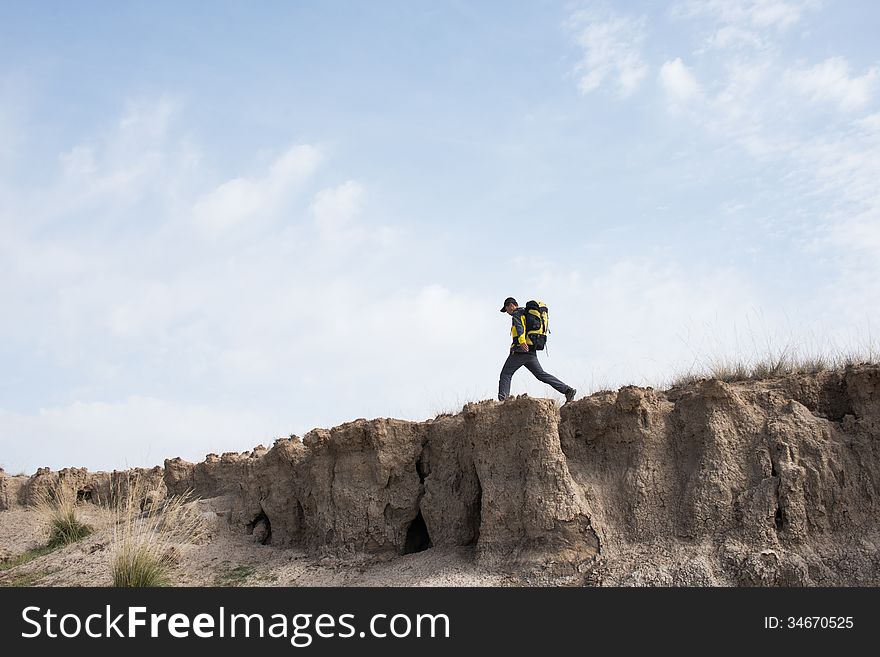 Hikers walking in a steep hill. Asian Youth. Hikers walking in a steep hill. Asian Youth