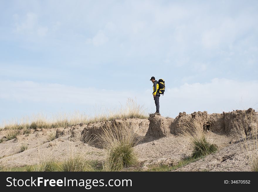 Hikers walking in a steep hill. Asian Youth. Hikers walking in a steep hill. Asian Youth