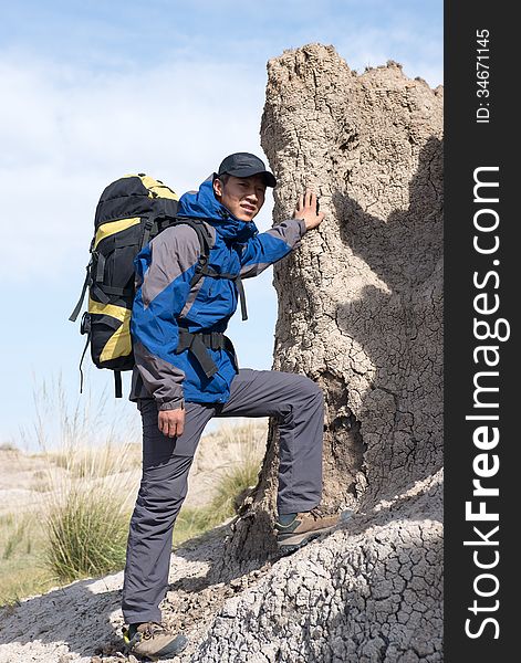 Hikers standing side resting on steep slopes. Hikers standing side resting on steep slopes