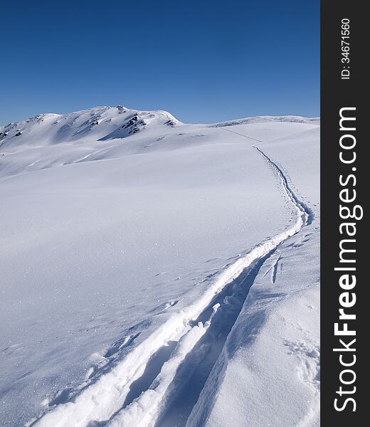 Deep skiing tracks in the snow on the alps at Koenigsleiten Austria. Deep skiing tracks in the snow on the alps at Koenigsleiten Austria