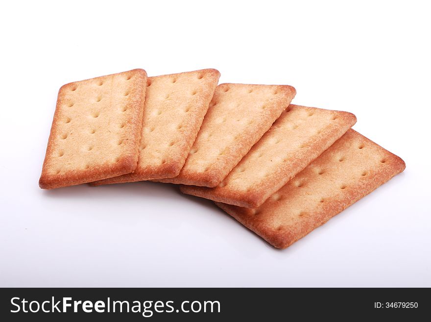 Stack of graham crackers over white.