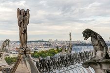 Statues And Chimeras &x28;gargoyles&x29; Of The Cathedral Of Notre Dame Stock Photo Statues And Chimeras &x28;gargoyles&x29; Of The Cathedral Of Notre Dame Stock Photo