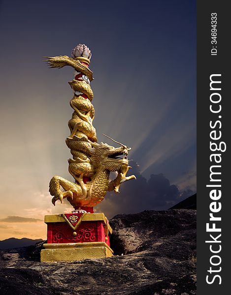 Chinese dragon image against beautiful sunset