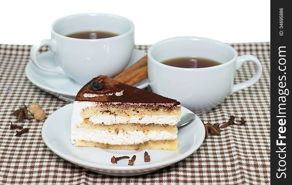 Morning cups of tea with the piece of delicious coffee Cake
