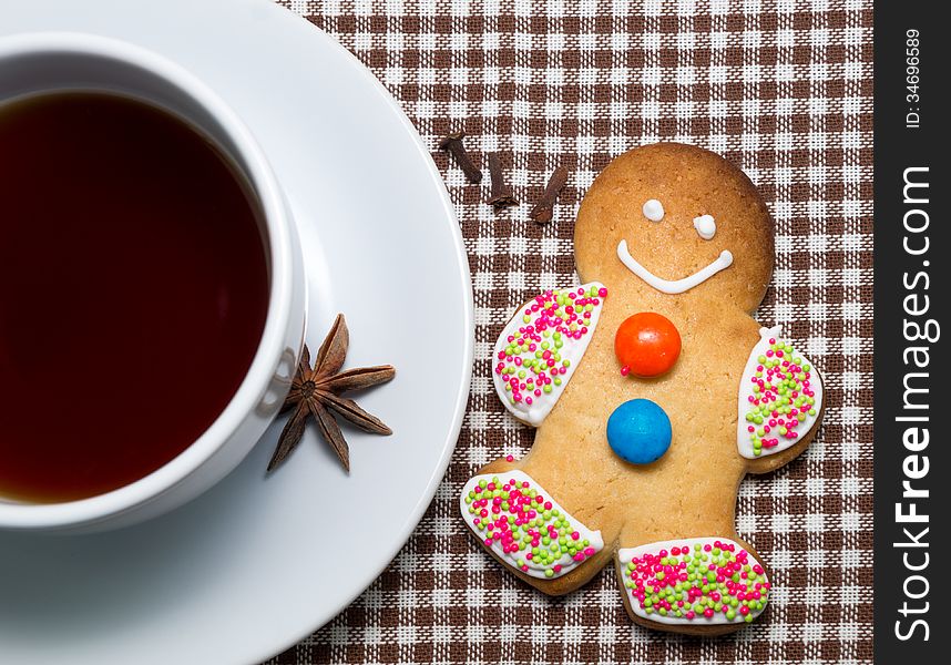 Gingerbread man with cup of tea and aniseed. Gingerbread man with cup of tea and aniseed