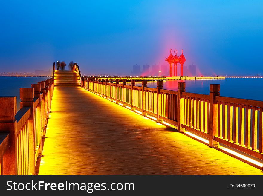 Golden Brown Wooden Trestle And Chinese Knot Which Red Light Shine