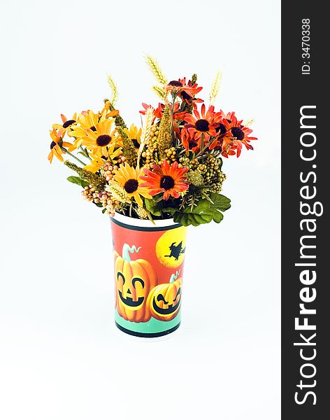 Flowers in a Halloween cup. Flowers in a Halloween cup