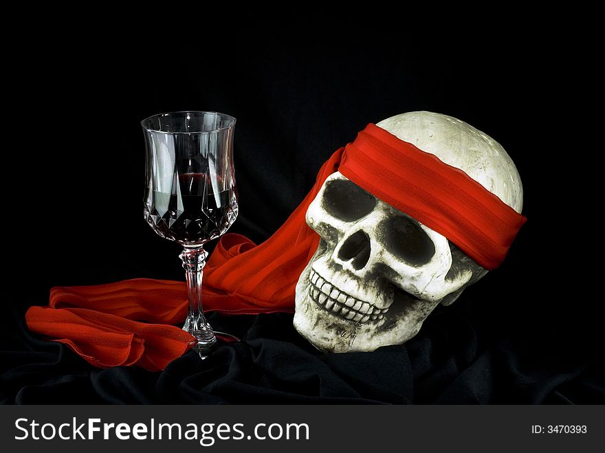 Skull with the glass of wine