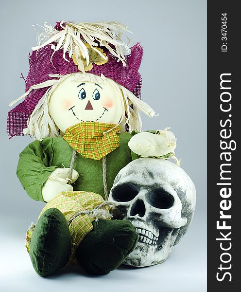 Scarecrow Huging Human Skull