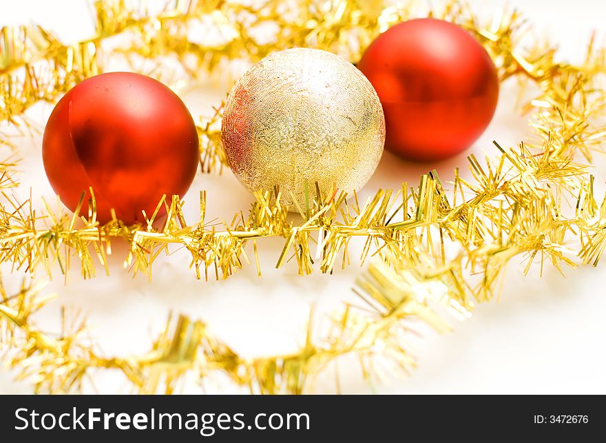 Christmas balls with garland on white