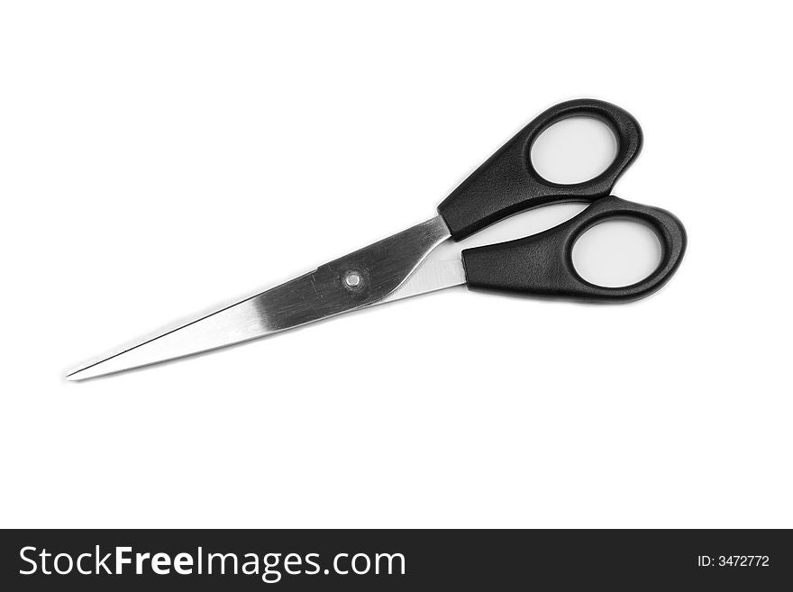 Silver-black scissors isolated on white. Silver-black scissors isolated on white