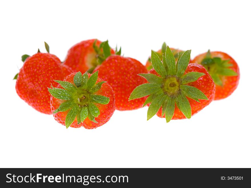 Fresh strawberries isolated on a white background (shallow focus!)