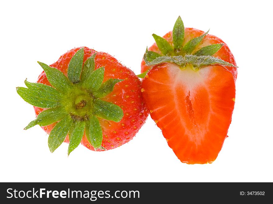 Fresh wet strawberries isolated on a white background